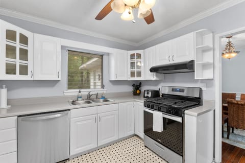 New stainless appliances and overlooks the back deck and HUGE back yard 