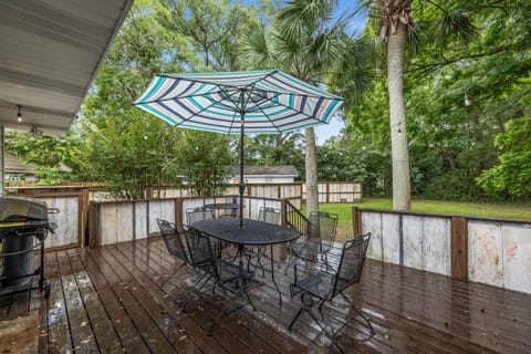 Back deck and Huge fenced backyard with a grill and seating for up to 15 