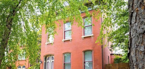 Charming brick exterior nestled in a peaceful neighborhood, just minutes from top St. Louis attractions. #TravelStLouis