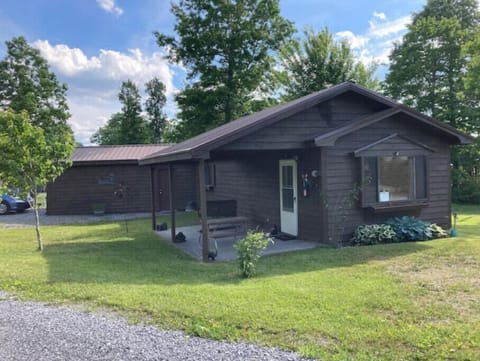 Front/side of cabin- park in driveway on left or in front of the window on right
