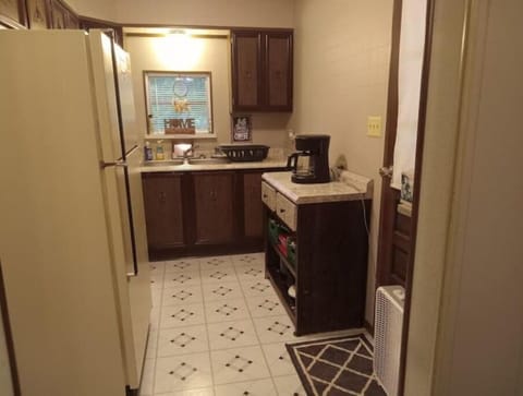 Top Level Kitchen with back door exit to deck