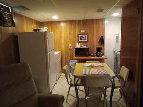Basement Level Kitchenette 
Dryer only No Washer
open concept Living room area
