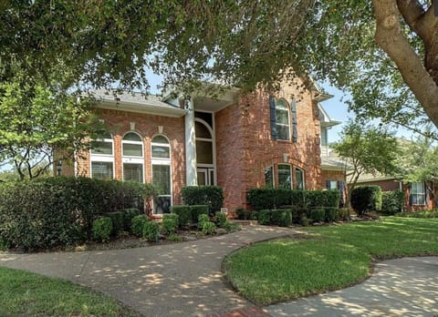 Front of our home! Large trees, beautiful sidewalks throughout the neighborhood.