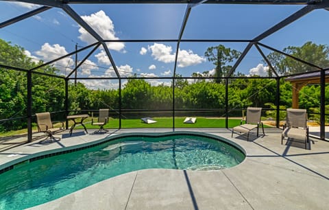Sparkling pool with spacious and secluded yard