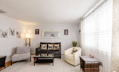 Homey and comfy living room where you and your family can relax and watch TV