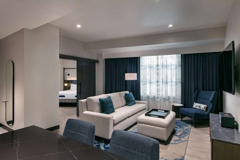 Lounge on the plush sofa after a day downtown.