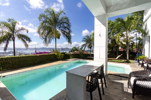 VILLA verandah and pool overlook Rio Harbour & SUGARLOAF.