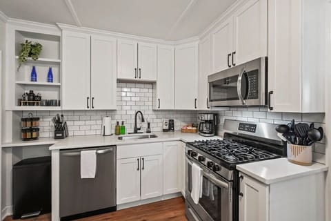Kitchen with White Subway tile backsplash