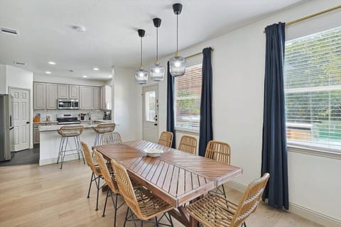 Grab a seat and settle into this restaurant-like dining room! With decorative design elements and a spacious layout, don’t forget to say a toast before digging in.