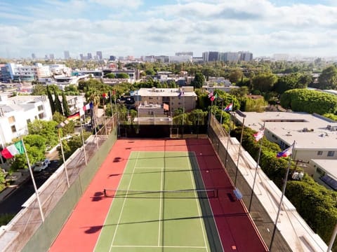 Play a match above the city on the rooftop court.