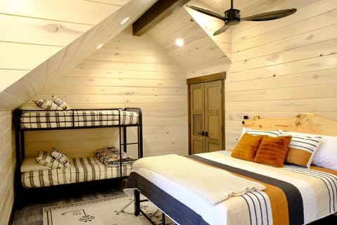 BEDROOM 1 WITH KING AND TWO TWINS