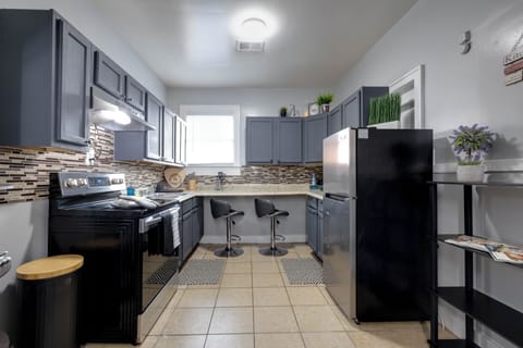 Fully equipped kitchen with stainless steel appliances