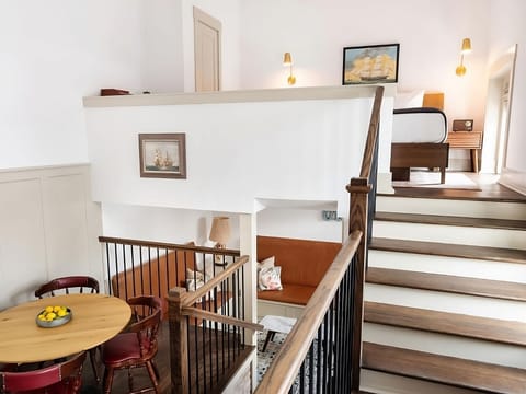 Wander upstairs to your loft bedroom in this open layout.