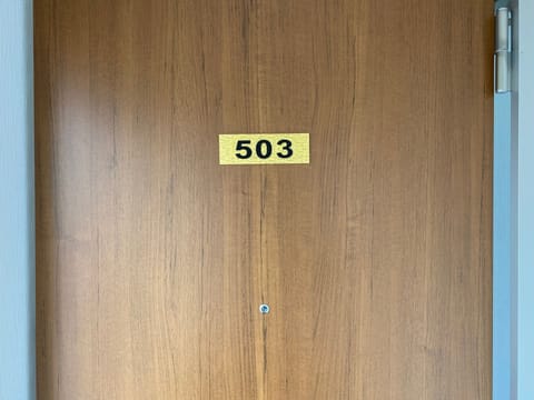 There is a key box on the doorknob of the entrance door of 503.