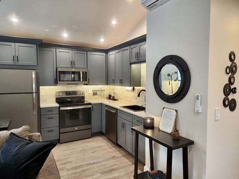 Our small kitchen is well stocked w china, serving dishes, pans, toaster, spices