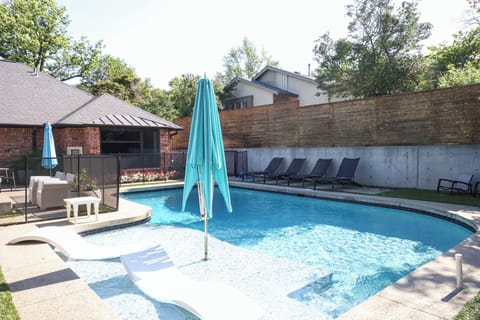 Beautiful outdoor pool with seating