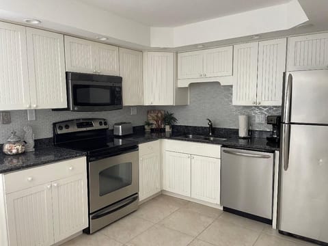 Kitchen that is fully stocked with cookware etc.