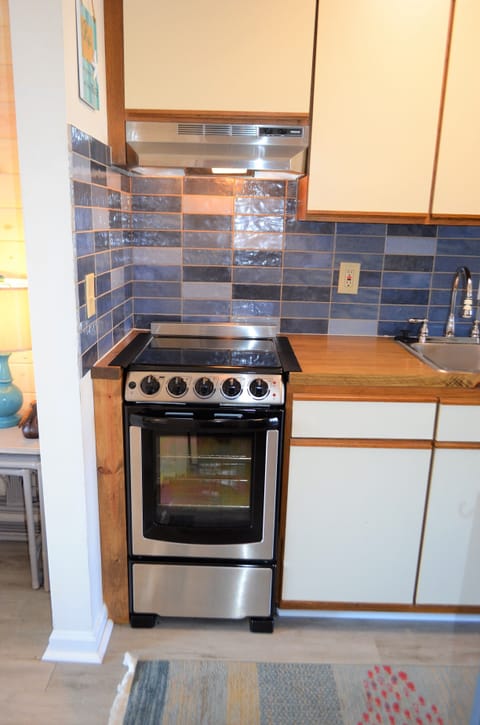 is fully equipped with dishes & cookware.