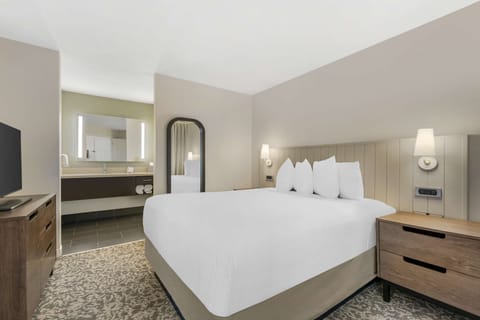 Refresh easily with an open layout and serene sleeping space.