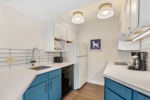Cook with ease in the bright kitchen with modern appliances.