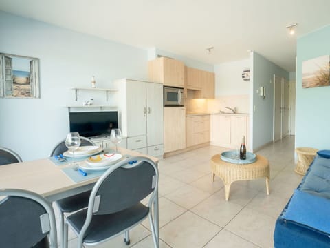 Furniture, Table, Blue, Chair, Cabinetry, Architecture, Building, Wood, Flooring, Floor