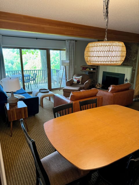 Dining table seats 6, with seating for 4 additional people at the kitchen.