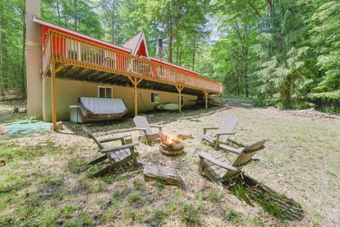 Backyard with firepit and hot tub - Serhii Vacation Rentals | Arrowhead Lake