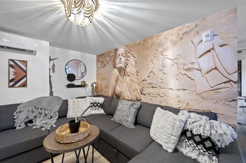 Cozy and uniquely designed living room space on the lower level