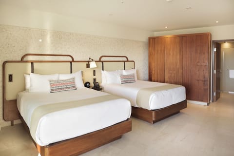 Comfortable Unit with 2 Queen beds. Exact unit will be assigned upon arrival. Views, colors and decor may vary.
