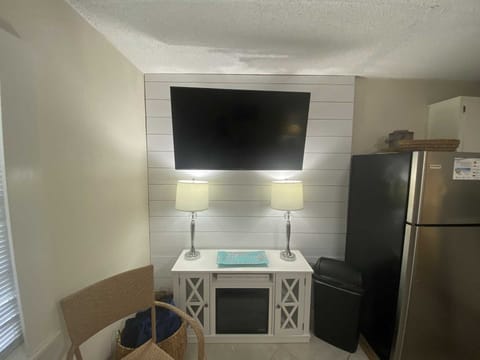 Stream your favorite shows on the smart tv located in the living room (user account required).