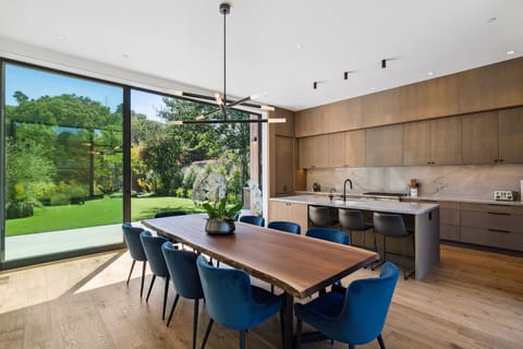 Our kitchen has floor to ceiling doors that fully slide open on each side.