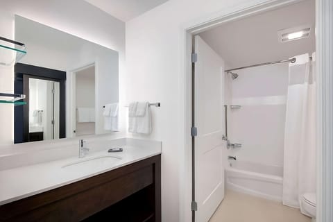Full bathroom with a shower/tub. Basic toiletries and towels are provided