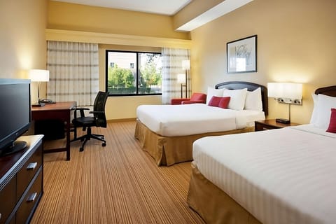 Wake refreshed in airy double beds with crisp linens.