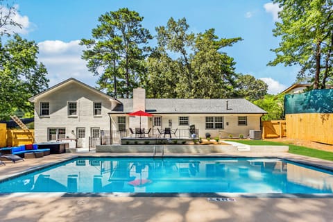 Pool level with picnic table, lounge sectional, hammock and sun loungers