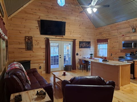 You are welcomed by the smell of fresh pine in our open concept living room area