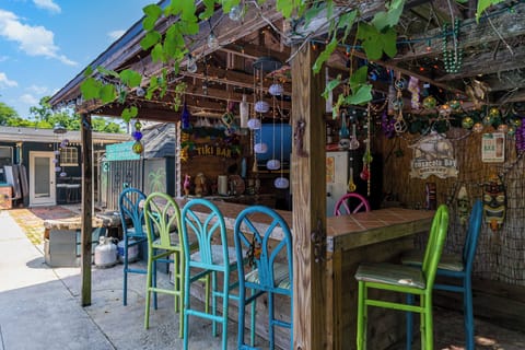 The tiki bar with it's own speakers, tv and refrigerator.