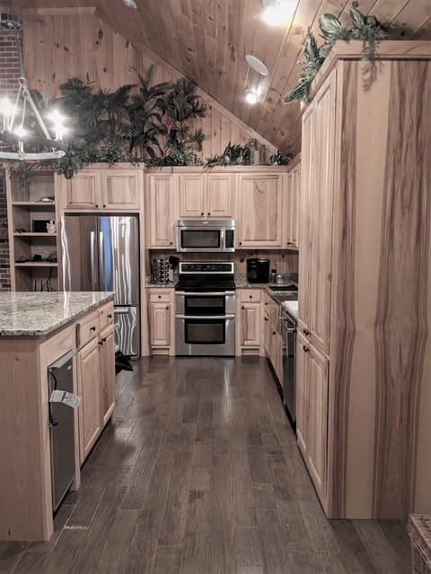 kitchen is fully equipped with full size appliances and dishwasher