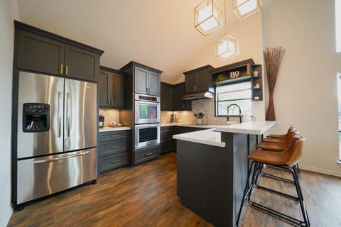 Large kitchen with extra seating.