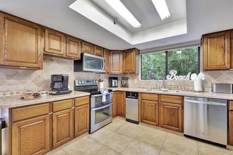 This meticulously designed space is equipped with a range of appliances and amenities to cater to all your cooking needs.