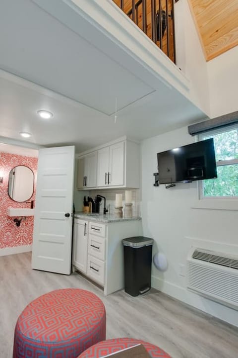 Cozy tiny cottage kitchenette stocked with essentials | prepare meals with ease, from morning coffee to dinner, perfect for couples or solo travelers seeking a relaxing nature escape