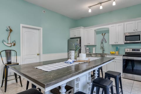 The home is outfitted with two bright kitchens and dining spaces!