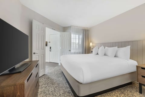 Stretch out and relax with plenty of space around the bed.