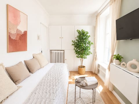 A light-filled living room with Smart TV and Wi-Fi