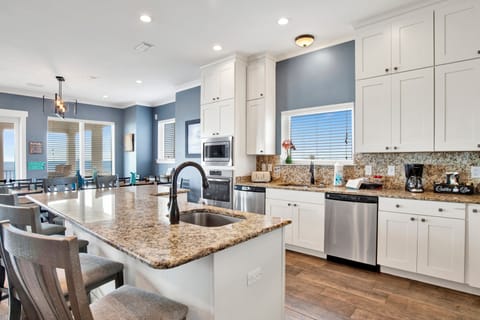 Fully equipped kitchen with stainless appliances and granite counter tops