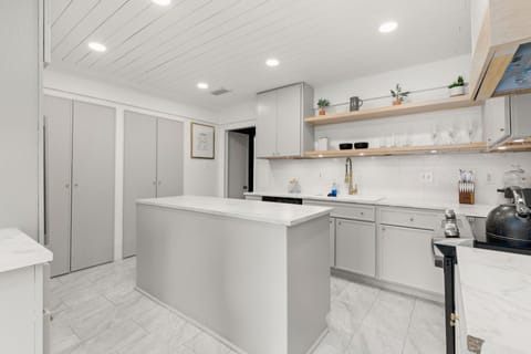 Enjoy our all-white-themed kitchen.