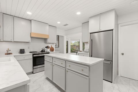 Kitchen- Has Refrigerator, dishwasher, microwave, toaster oven, coffee maker.