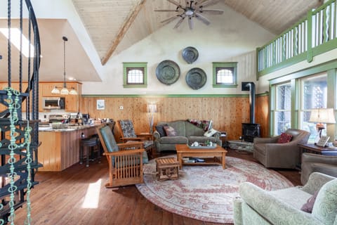 Great Room facing the lake with cozy gas fireplace and luxury in-floor heating