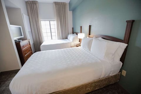 Wake up to soft daylight in a bright, airy room.