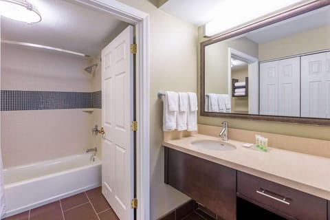 Full bathroom with a shower/tub. Basic toiletries and towels are provided