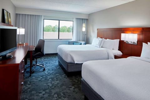Settle into a bright double-queen room with space to spread out.